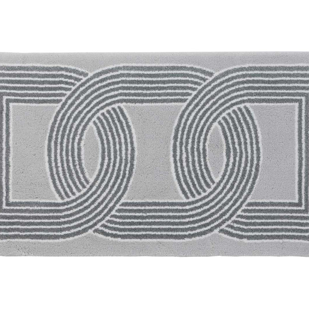 Gray rug with circular pattern on a white background